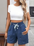 Women's lightweight faux-denim shorts with an elastic waist and drawstring.